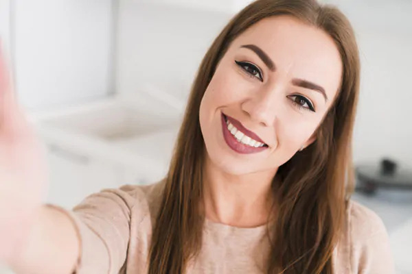 front-view-woman-taking-self-photo