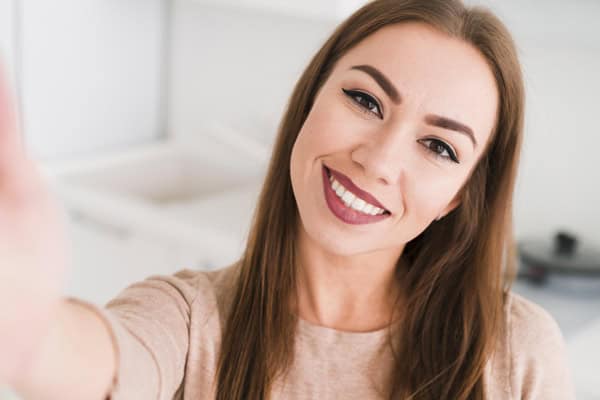 front-view-woman-taking-self-photo